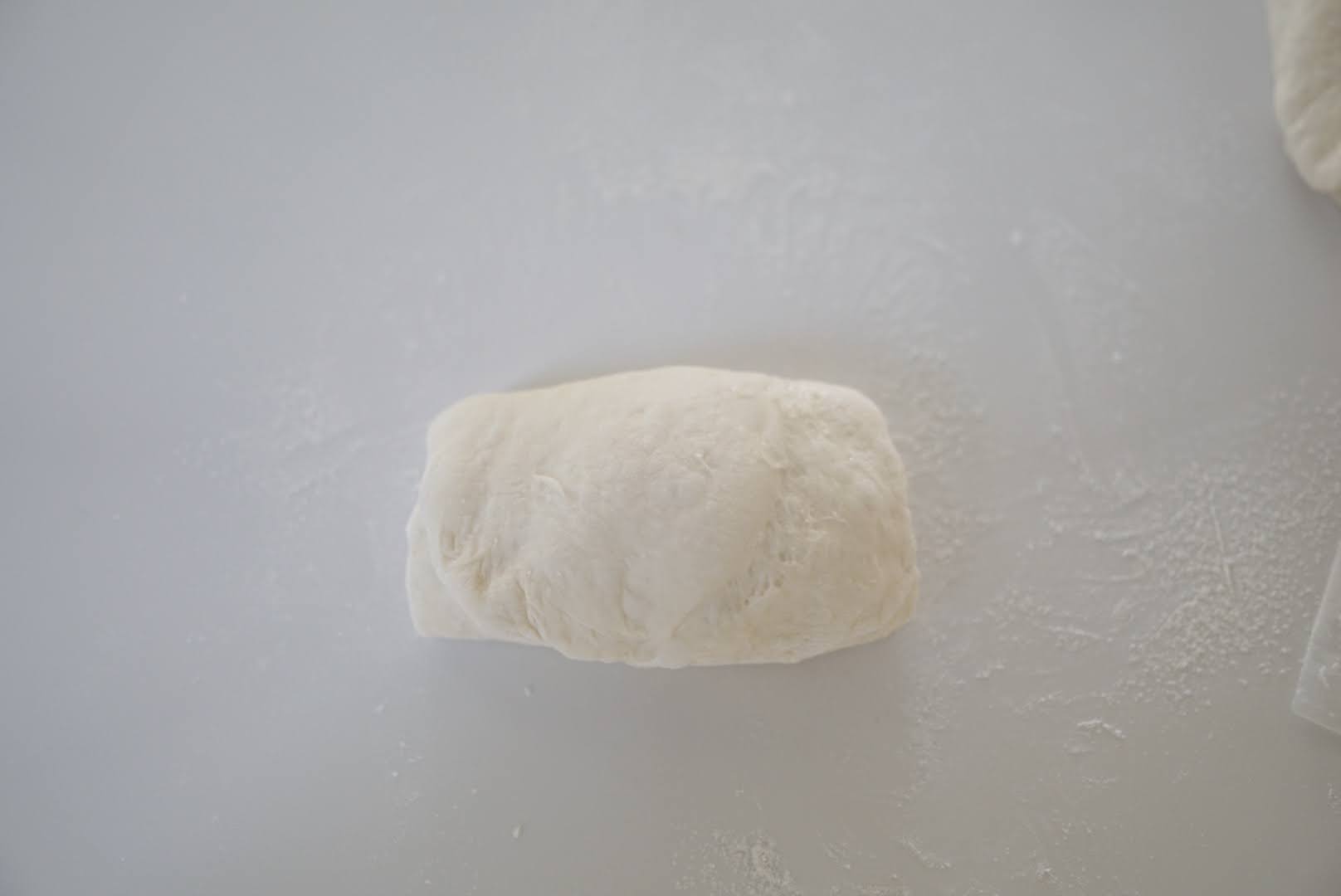 向こう側からも三分の一折りたたみます。