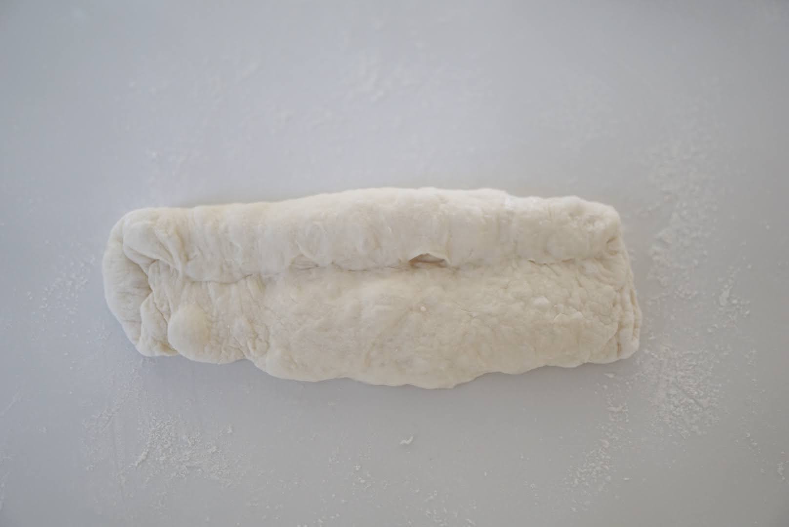 向こう側から巻き込みます。