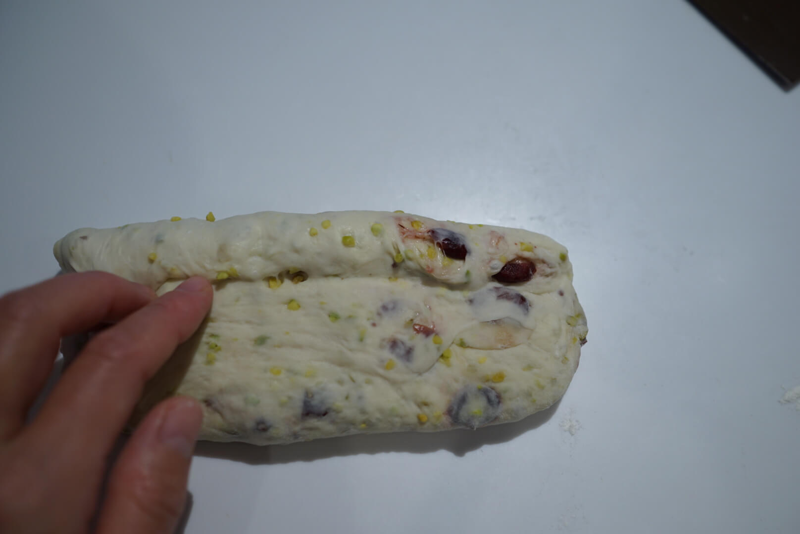 向こう側から巻きます。